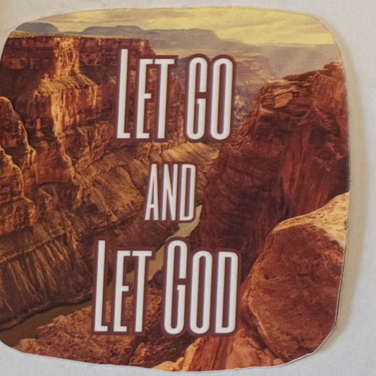 Grand Canyon Background with yellow sunset sky with text in all caps "Let Go and Let God"